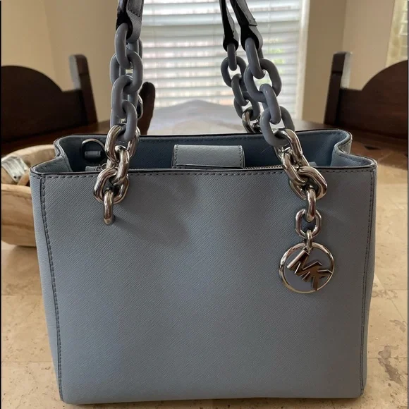 Michael Kors bag with matching small Light Blue with silver chain